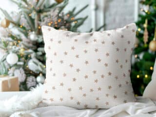 Christmas LONETA pillowcase beige stars on gold by Stofex.